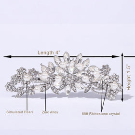 Hapibuy comb styled in a bride's updo adding polished sparkle for photos