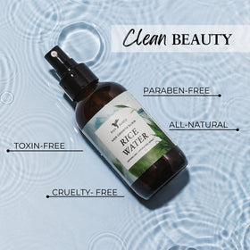 HAPPIE HUMMINGBYRD bottle beside rose and aloe highlighting natural ingredients