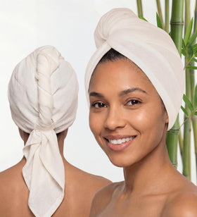 Harmony Weave front view of ivory towel wrap showing compact packaging and benefit of silky softness