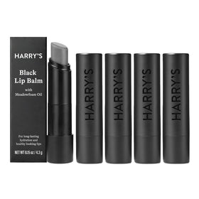 Harry's black lip balm front tube showing sleek matte design and portability