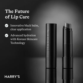 Harry's black lip balm in a jeans pocket demonstrating compact scale and carry