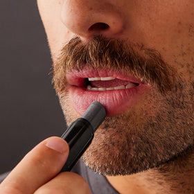 Harry's black lip balm ingredient focus meadowfoam oil bottle for moisturizing benefit