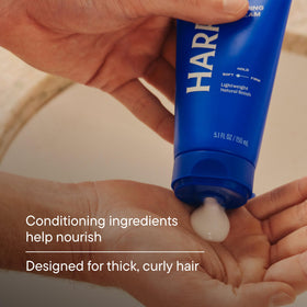 Harry's cream on hand showing recommended small amount