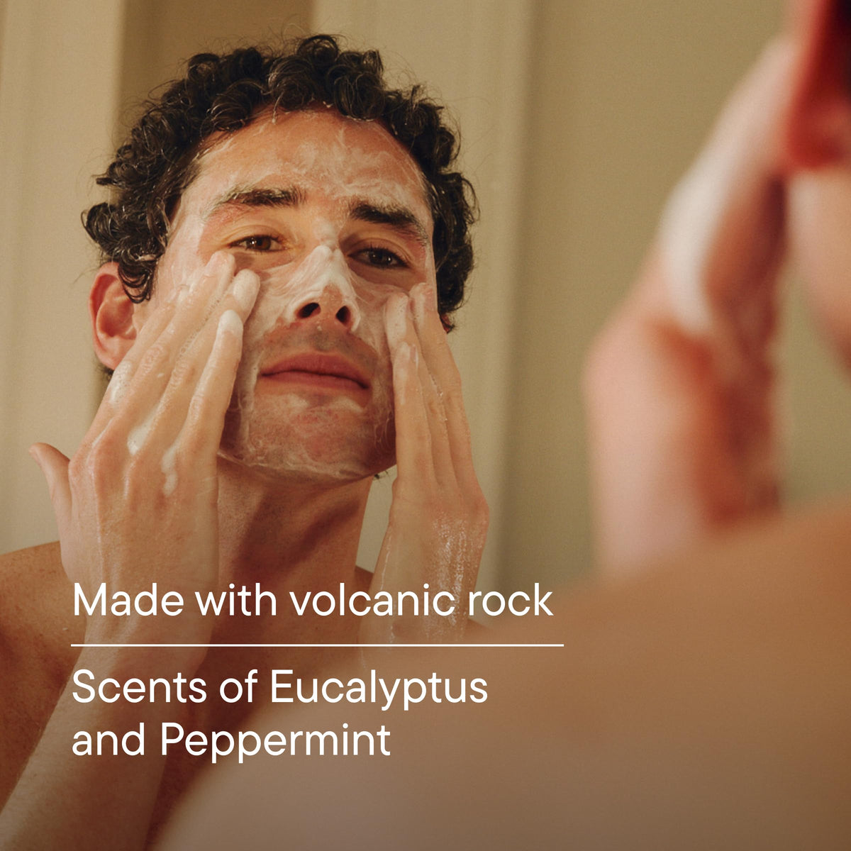 Harry's ingredient label close-up highlighting volcanic rock and essential oils information