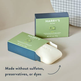 Harry's Shiso bar next to razor for scale, showing compact size and convenient portability