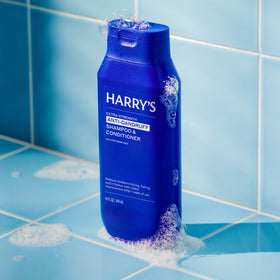 Harry's single bottle closeup label highlighting 2% pyrithione zinc benefit