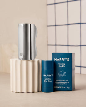 Harry's cooling eye sticks chilled in fridge showing enhanced cooling benefit