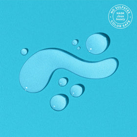 HASK texture drop on hand highlighting lightweight, non-greasy feel