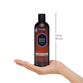 HASK bottles in shower in use showing lather and rinsing benefit