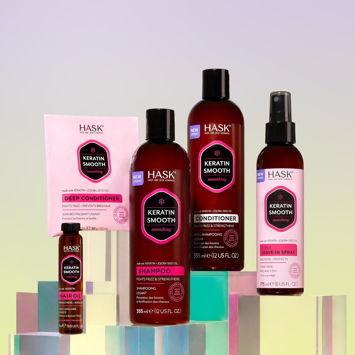 HASK bottles held in hand to show scale and travel-friendly size