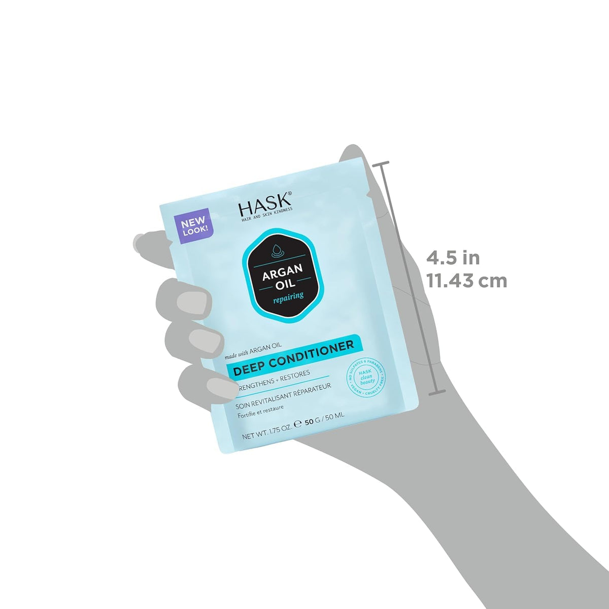 HASK packette being applied to damp hair to deliver argan oil hydration and repair