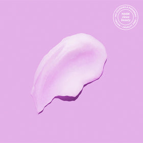 HASK shampoo lather on hand illustrating gentle foam and effective cleanse