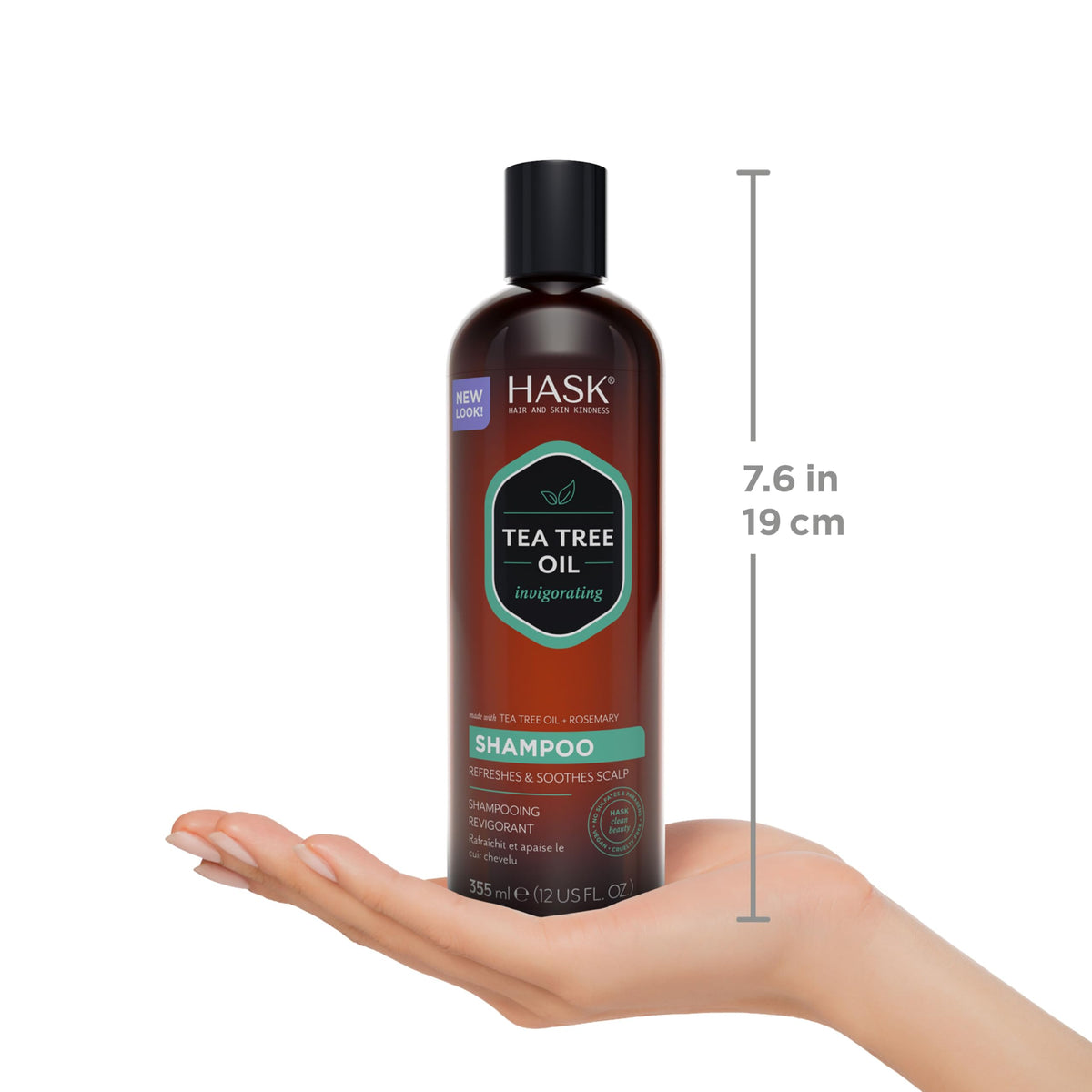 HASK bottles in hand showing 12oz scale for package sizing clarity