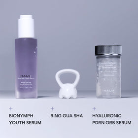 HAUA bottle beside a ruler for size comparison, clarifying 1.58 oz scale