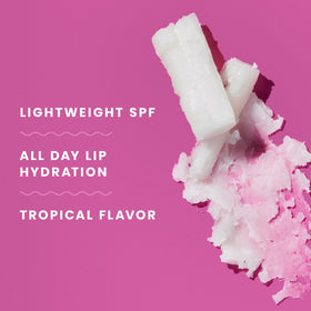 Hawaiian Tropic lip balm inside a beach bag ready for sun protection outdoors