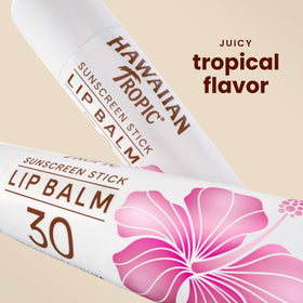 Hawaiian Tropic open lip balm stick texture highlighting smooth application