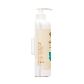 Hawaiian Tropic bottle being dispensed to show controlled portioning