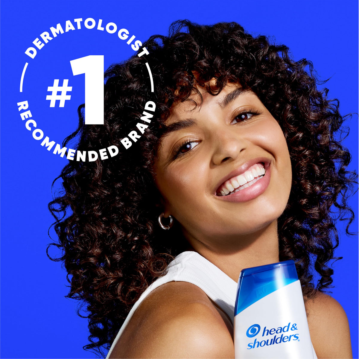 Head & Shoulders bottle held in hand to show 32.1 fl oz scale and value