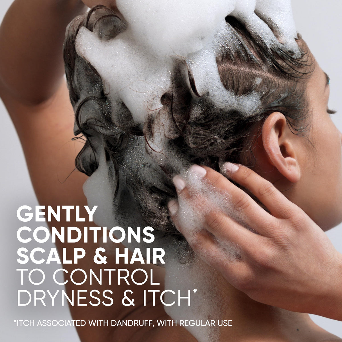Head & Shoulders in-shower application demonstrating gentle scalp massage