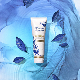 Head & Shoulders on shower shelf in lifestyle setting enhancing routine