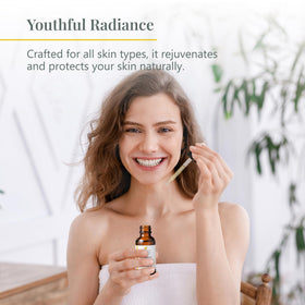 Health Priority Naturals applying oil to cheek to boost skin hydration