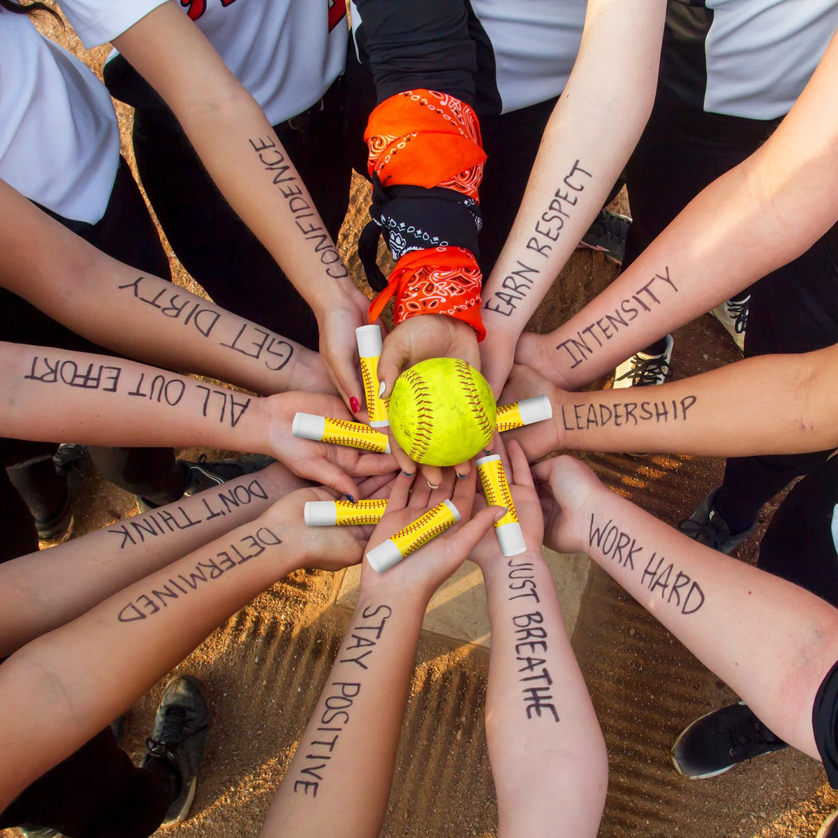 Heigble lip balm beside softball gear showing game-day convenience