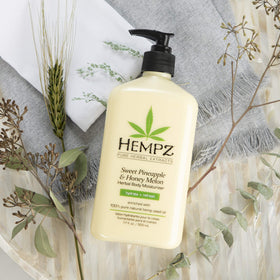 Hempz on bathroom shelf next to towel illustrating daily routine convenience