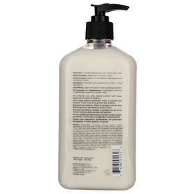 Hempz pump dispensing lotion on arm to show easy application and immediate softness
