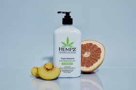Hempz 17 oz size comparison next to hand highlighting generous supply for daily use