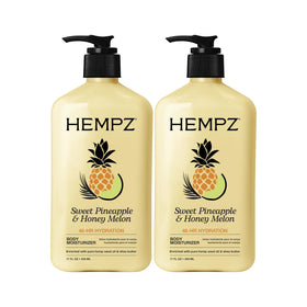 Hempz front packaging showing two 17 fl oz bottles and tropical scent benefit
