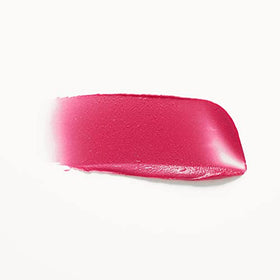Henné Organics Azalea inside a makeup bag indicating travel-friendly use
