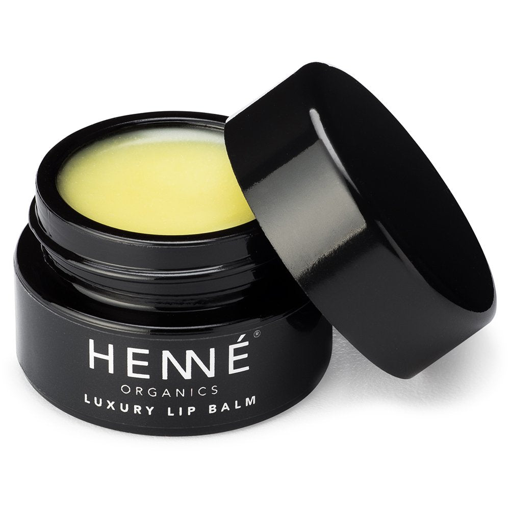 HennÃ Organics front jar showing luxe metal packaging and travel convenience