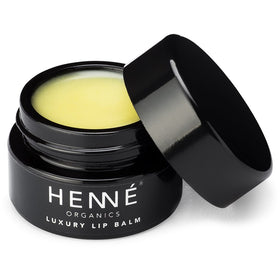 HennÃ Organics front jar showing luxe metal packaging and travel convenience