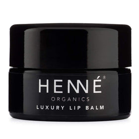 HennÃ Organics ingredient mix close-up showing natural oils and butters benefits