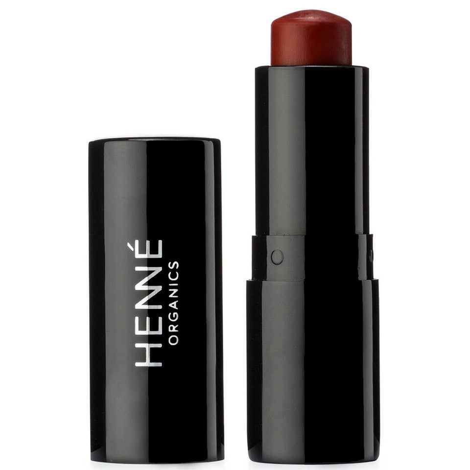 Henné Organics front tube showing sleek packaging and convenient size