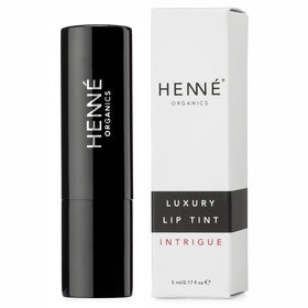 Henné Organics open tube and applicator demonstrating smooth glide benefit