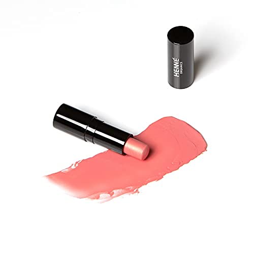 Henné Organics texture close-up revealing creamy peach tint and hydrating buttery finish