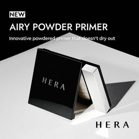 HERA primer opened with included brush demonstrating convenient application benefit