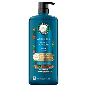 Herbal Essences 20.2 fl oz bottle next to common household item for scale