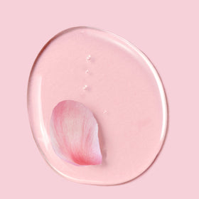 Herbal Essences in-shower lifestyle shot demonstrating smooth, shiny results