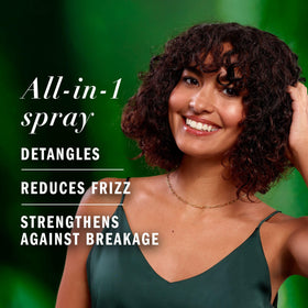 Herbal Essences nourishing spray bottle shown upright for quick lightweight care