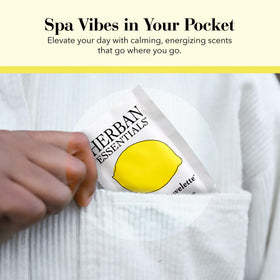 Herban Essentials lemon wipe used outdoors showing quick refresh on the go
