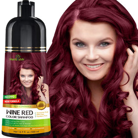 Herbishh front packaging showing wine red shampoo and benefits