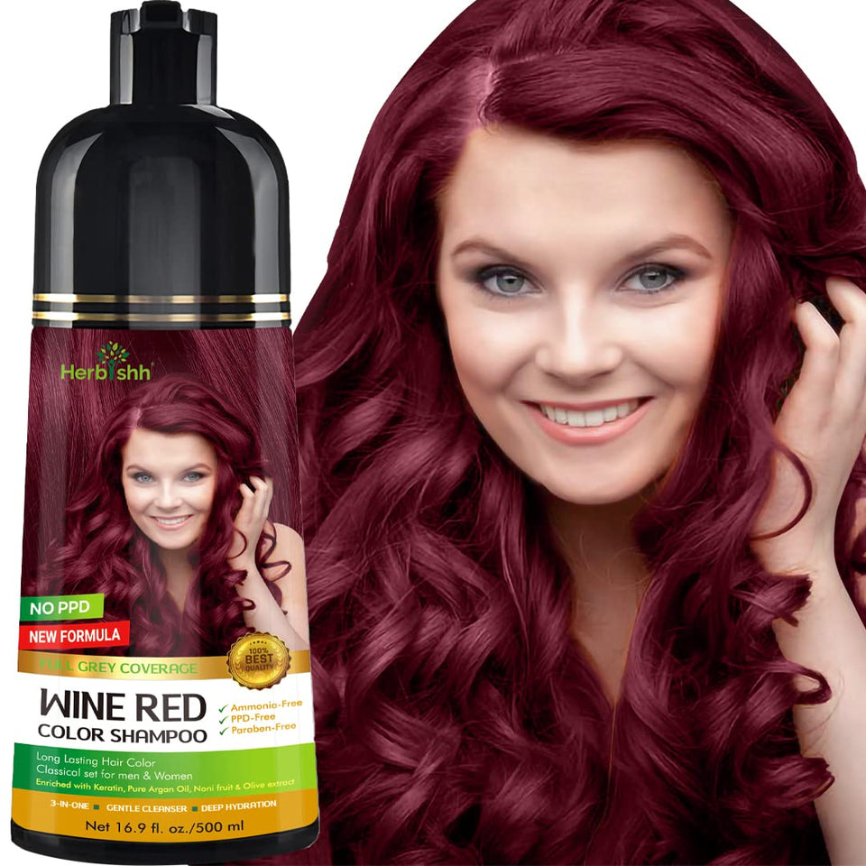 Herbishh front packaging showing wine red shampoo and benefits