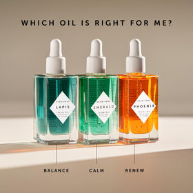 Hand applying HERBIVORE Phoenix oil, illustrates quick absorption and skin conditioning benefit
