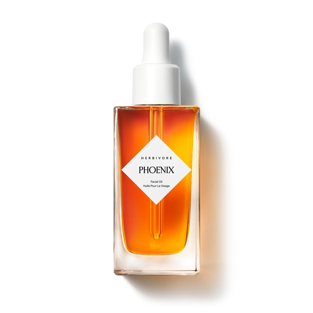 HERBIVORE Phoenix bottle front view showing sleek label and size benefit