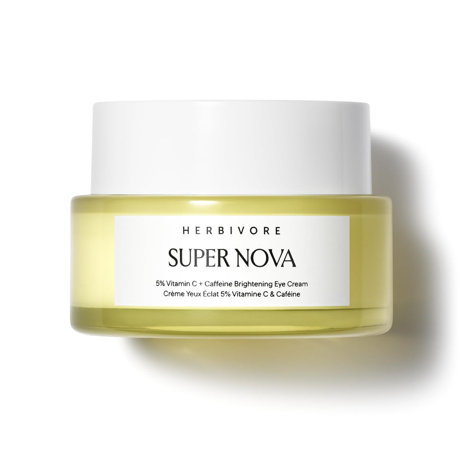 HERBIVORE front packaging of Super Nova eye cream shows compact jar and label, brightening benefit