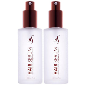 HerStyler front packaging showing two glass bottles and secure caps for travel-friendly use