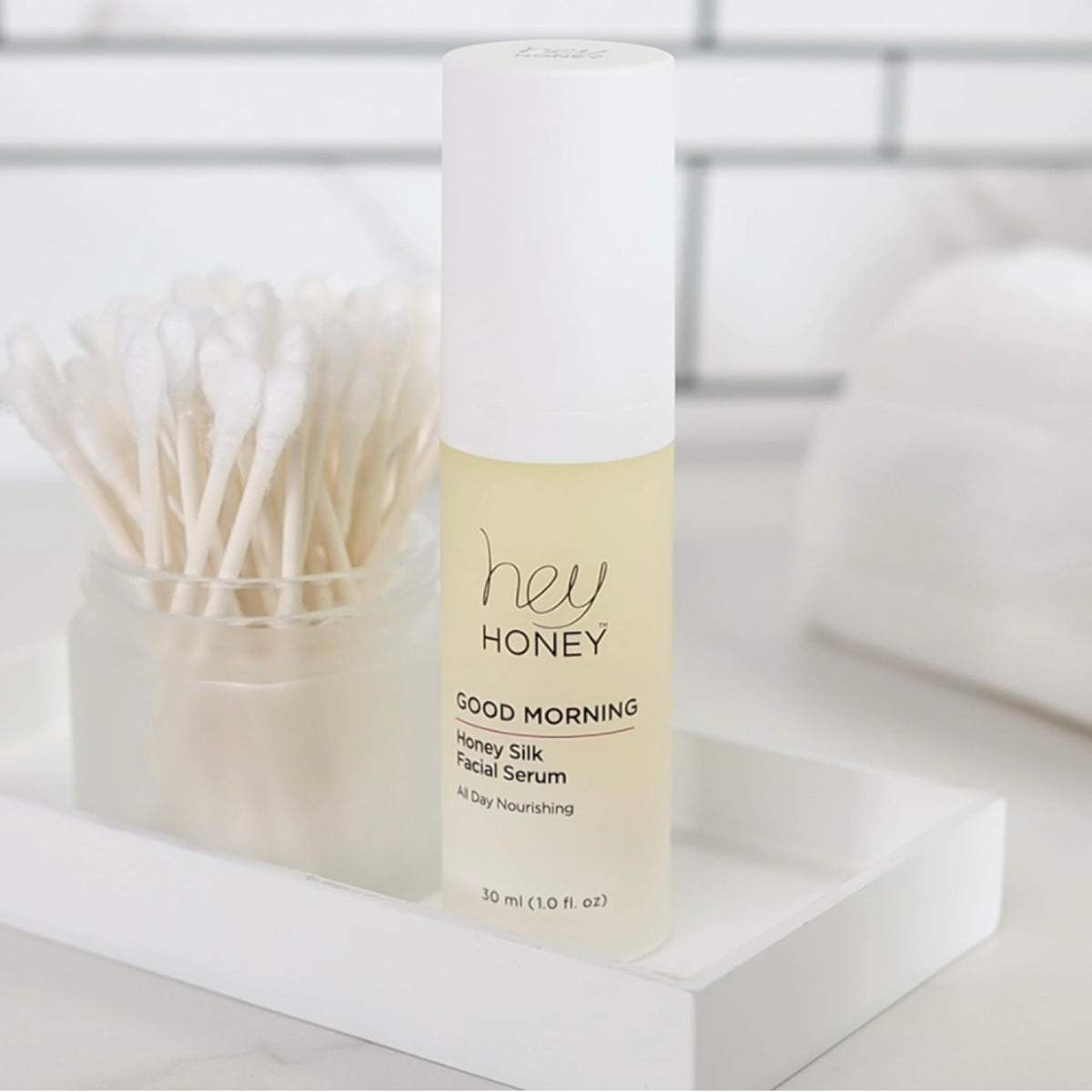 Hey Honey on bathroom shelf lifestyle shot conveying everyday routine and elevated self-care