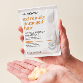 Hi-Pro-Pac being applied in shower to damaged hair for deep conditioning
